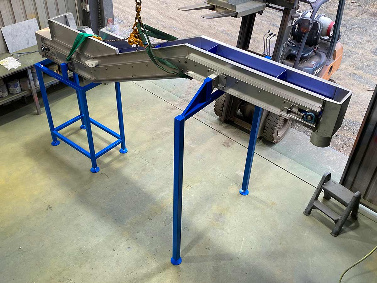 how custom conveyors improve efficiency